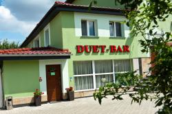 Duet pokoje i restauracja