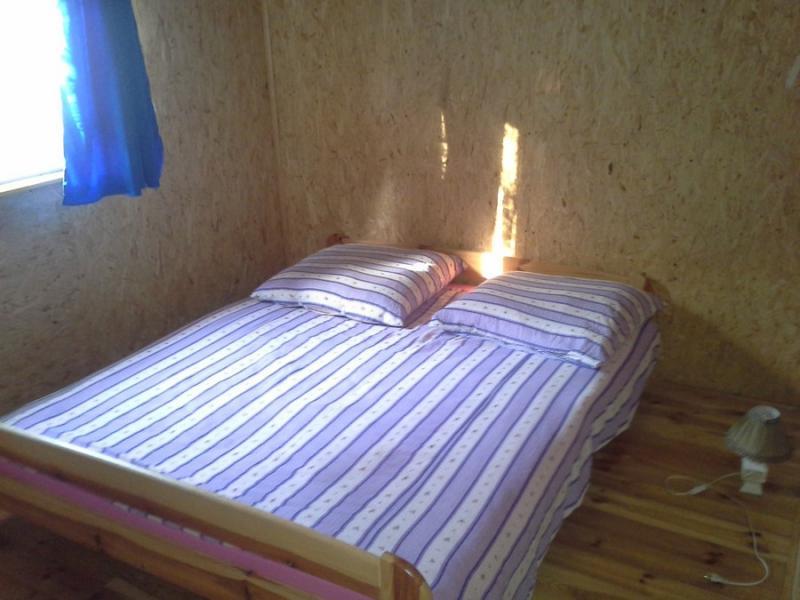 Domki nad jeziorem Mikoajskim